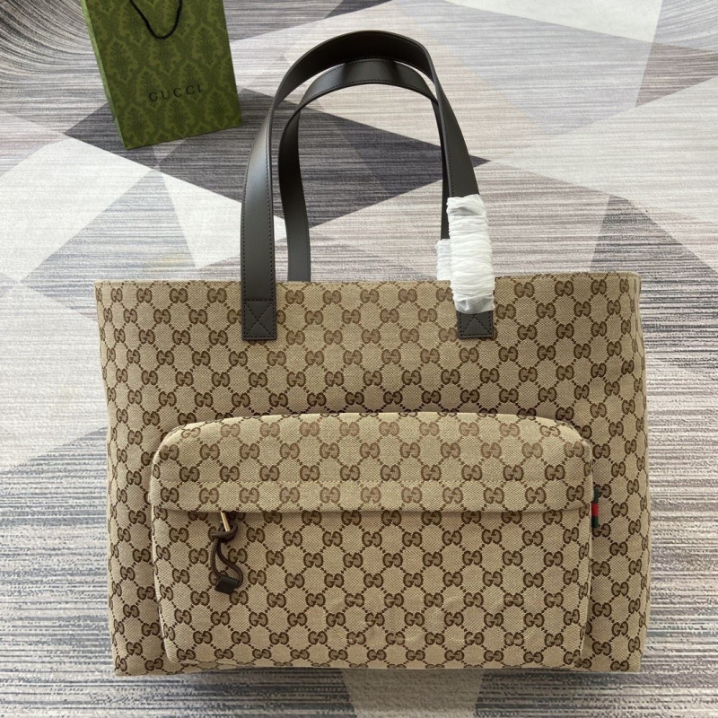 G*u*i shopping bags